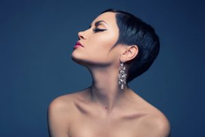Sensual portrait of a beautiful lady with diamond earring
